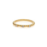 Gold Ring mit Kugeln und drei Zirkonia Steinen