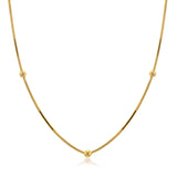 Goldene Schlangenkette mit drei kleinen Kugeln
